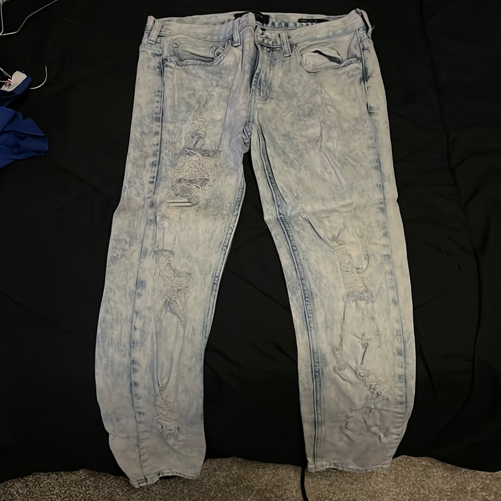 Blue jeans with holes skinny